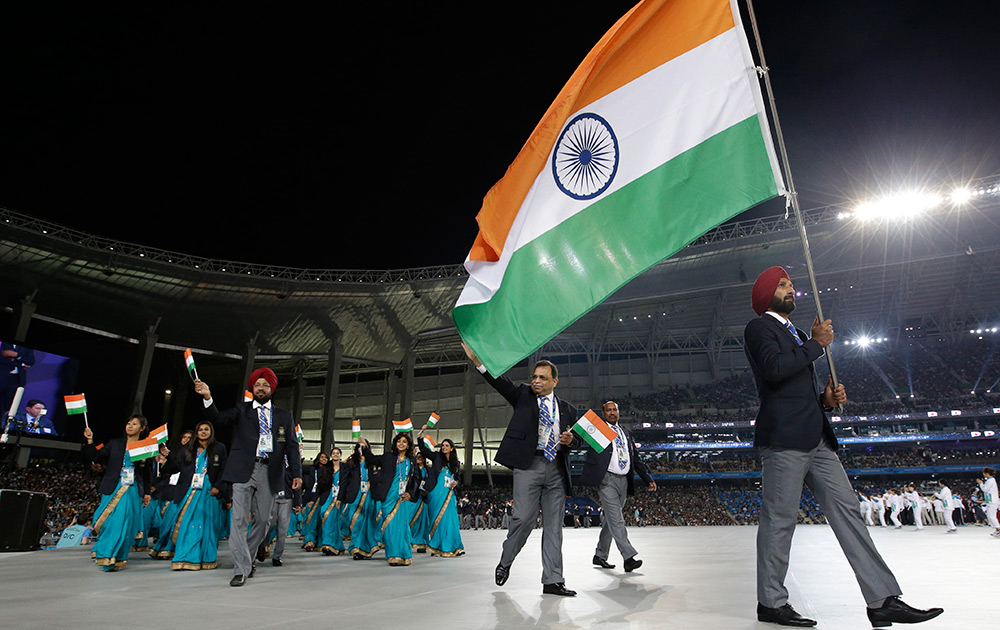 Sardara Singh Leading The Indian Contingent at the Opening Ceremony