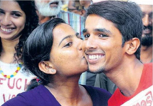 Kiss of love protesters kissing infornt of law college