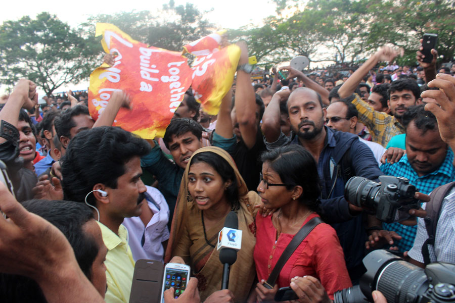 Kiss of love protesters talking to media