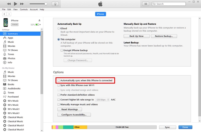 Uncheck Automatically sync when this iPhone is connected