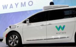 FILE PHOTO: Waymo unveils a self-driving Chrysler Pacifica minivan during the North American International Auto Show in Detroit