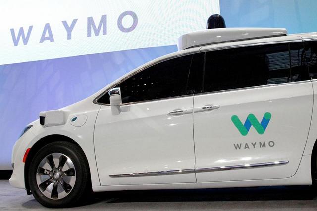 FILE PHOTO: Waymo unveils a self-driving Chrysler Pacifica minivan during the North American International Auto Show in Detroit