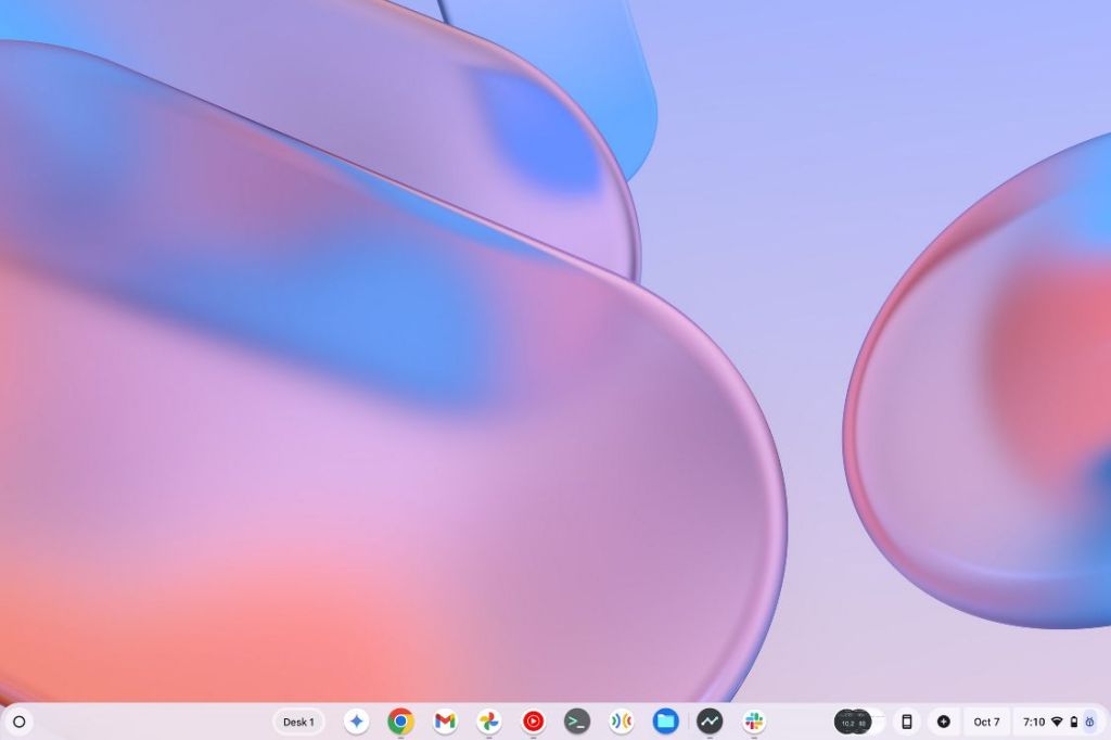 preview ChromeOS home screen with a bluish pink wallpaper | Chromebook vs Laptop