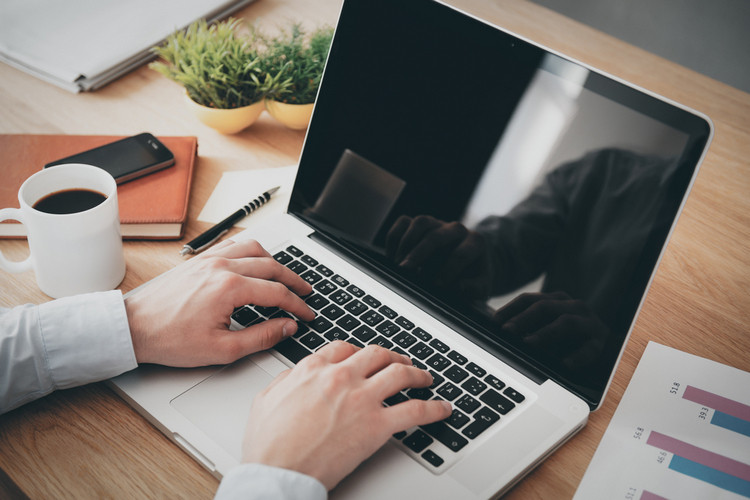 Man using Laptop Notebook PC shutterstock website