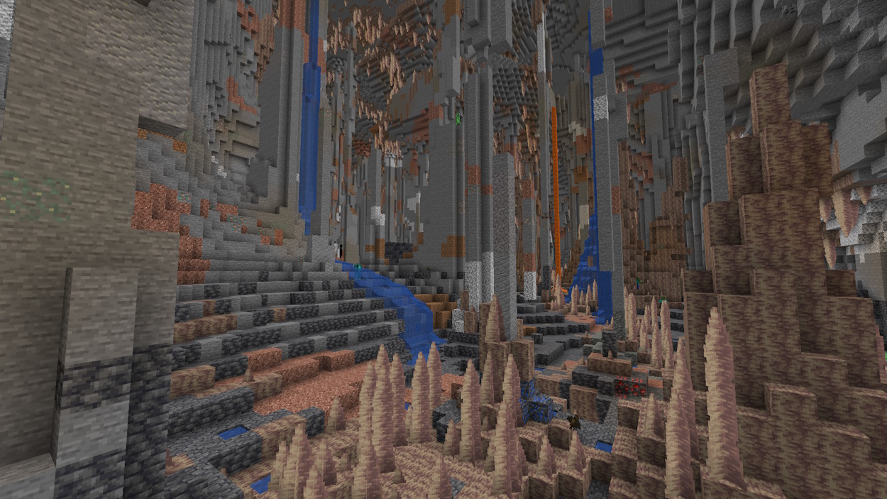 Minecraft seed with a massive dripstone cave with lots of stone pillars and pointed dripstone