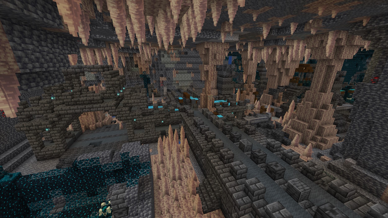 Ancient city generated on the edge of a dripstone cave so the dripstone blocks and pointed dripstone started replacing some parts of the city