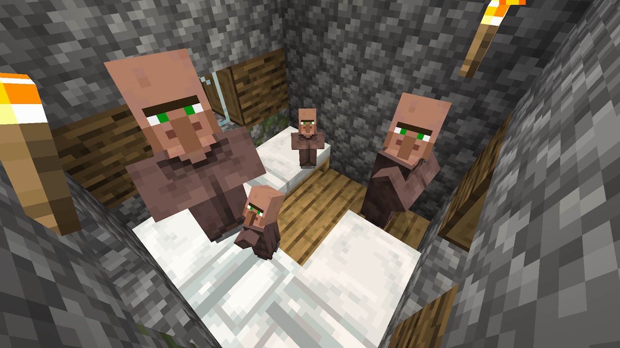Two adult villagers who bred and produced two baby villagers in a Minecraft house