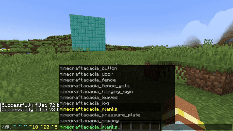 Creating a cube of acacia planks using the fil -command in Minecraft