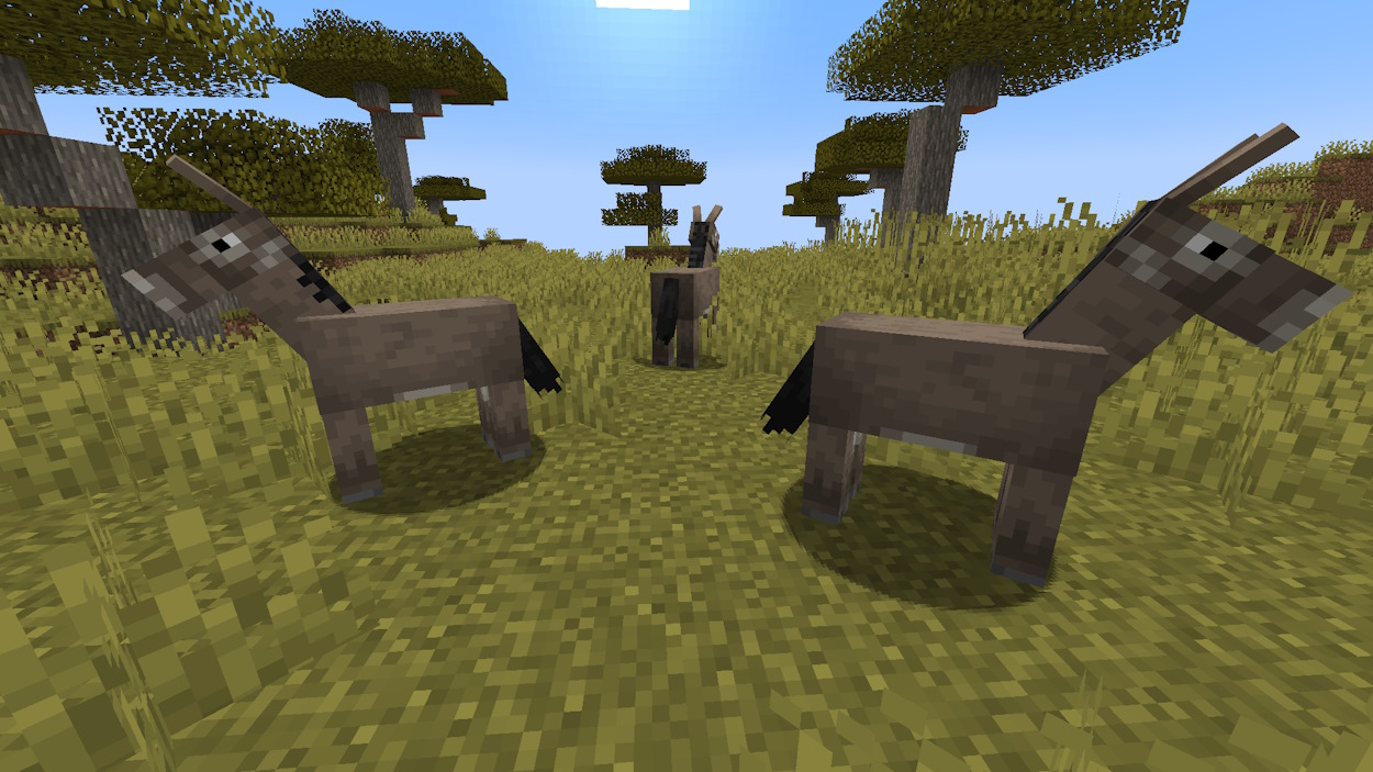 Minecraft mobs donkeys in a savanna