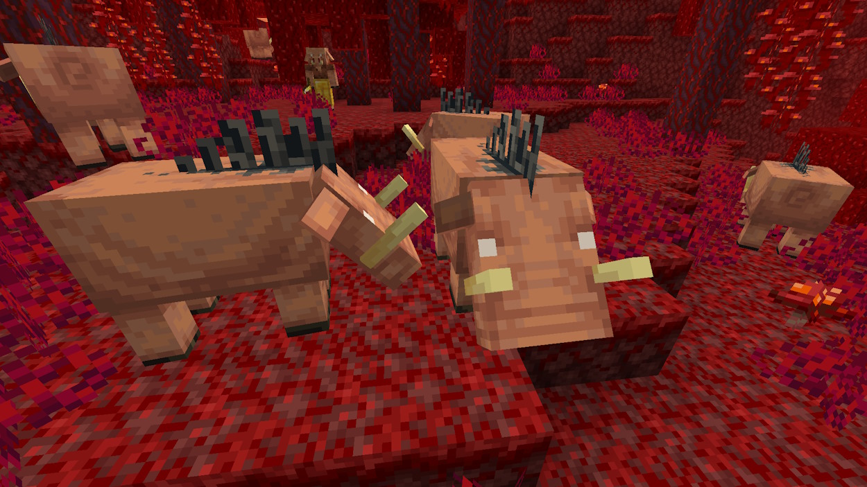 Minecraft mobs hoglins in a crimson forest