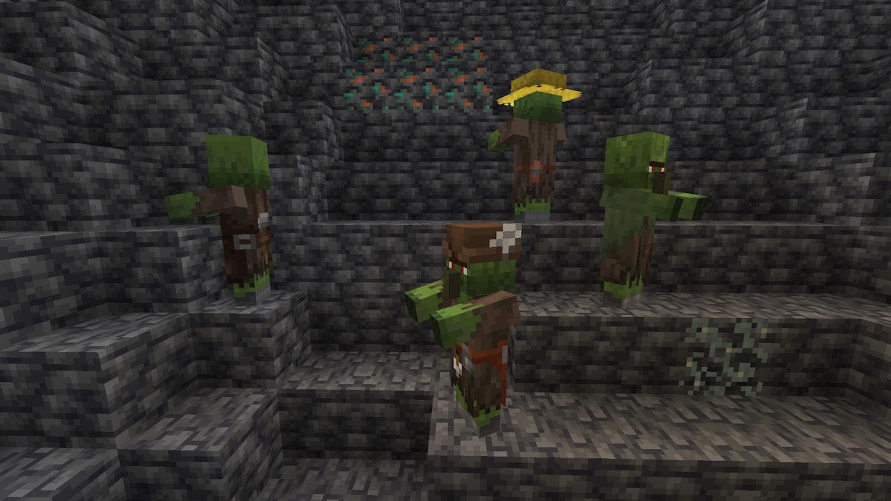 Minecraft mobs zombified villagers in a cave