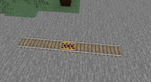 Powered Rail and Regular Rails in a row
