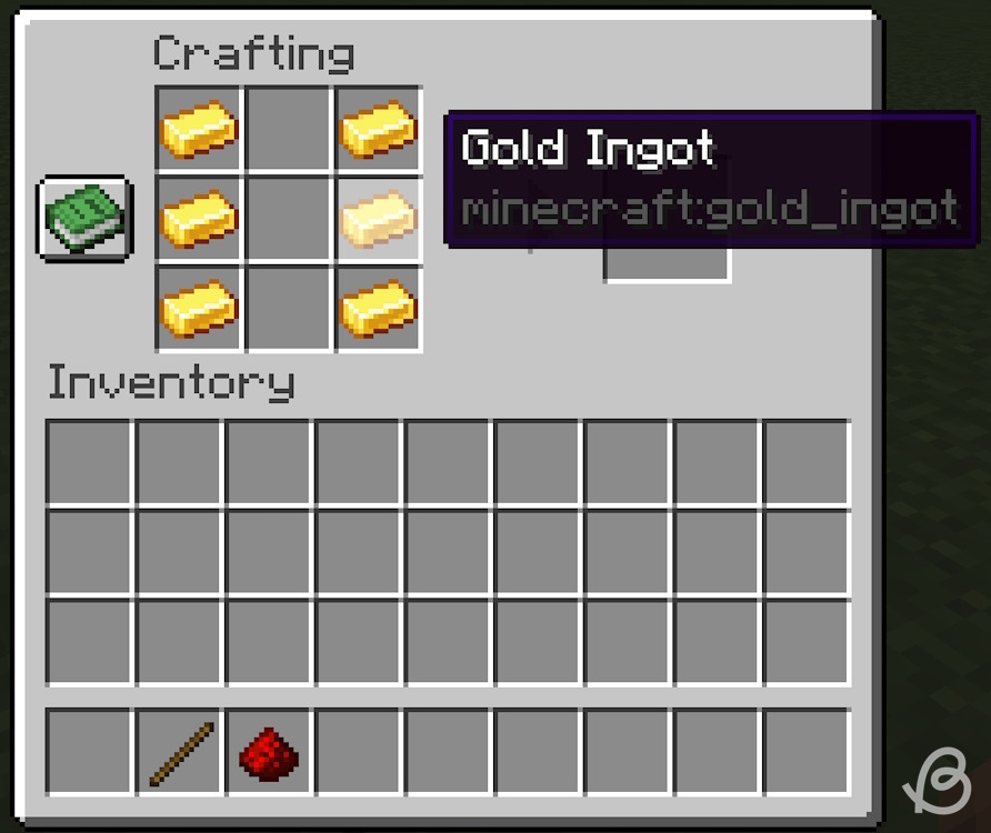 Place 6 gold ingots filing the left and right columns of the crafting grid