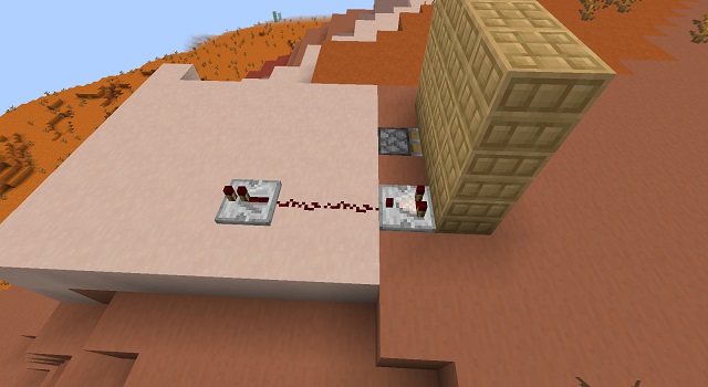 two pieces of Redstone dust followed by a Redstone repeater