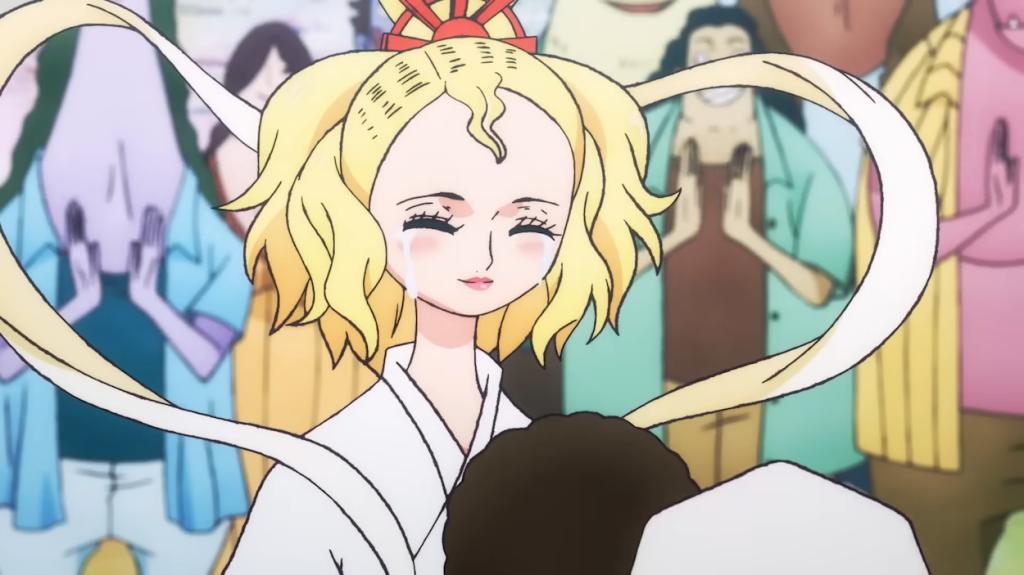 Queen Otohime hugging a child in One Piece anime