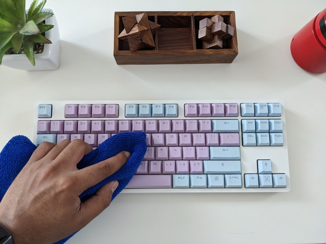 Use a microfiber cloth to wipe your keyboard. 
