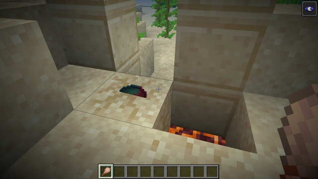 Brushing suspicious sand and revealing the sniffer egg in Minecraft