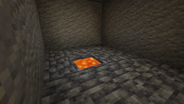 Lava source, one of the brightest Minecraft light source blocks, in a dark room