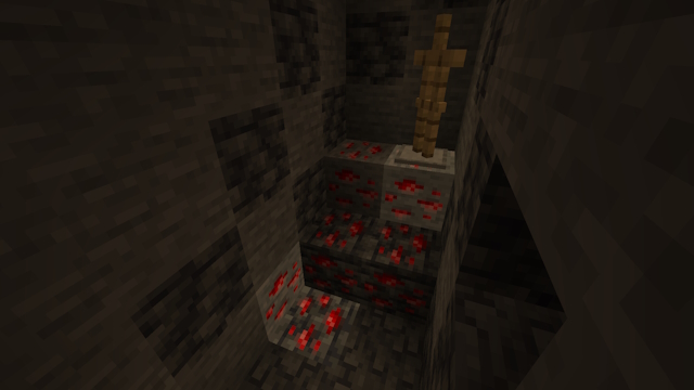 Armor stand activating a regular redstone ore and some of the other redstone ores are activated and some are not.