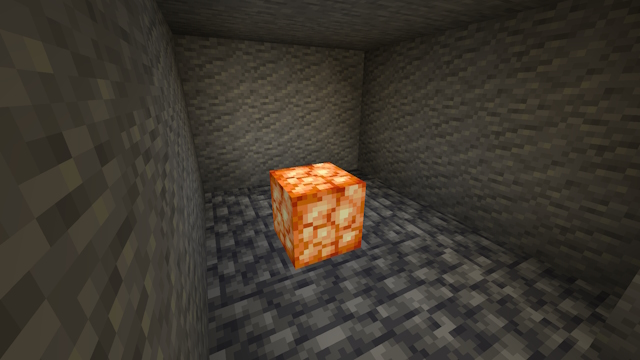 Shroomlight, one of the brightest Minecraft light source blocks, in a dark room