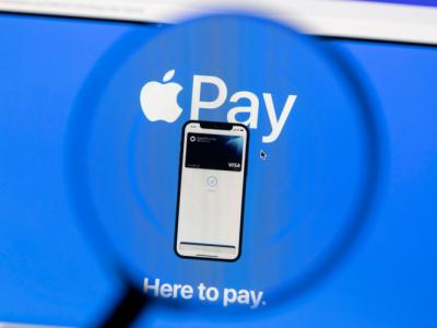 Apple Pay showcased on an iPhone with a blue background