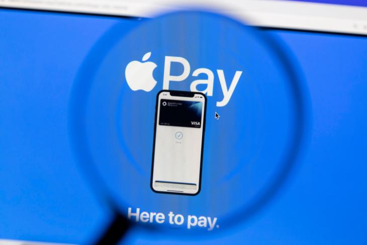 Apple Pay showcased on an iPhone with a blue background