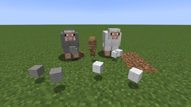 Two sheep who you can get wool from in Minecraft