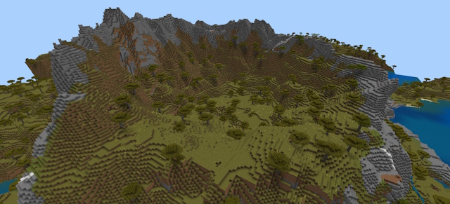 Stony peaks forming a half circle around a savanna biome
