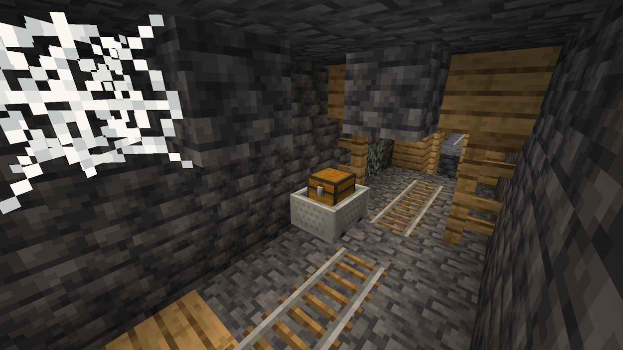 Minecart with a chest in a mineshaft 