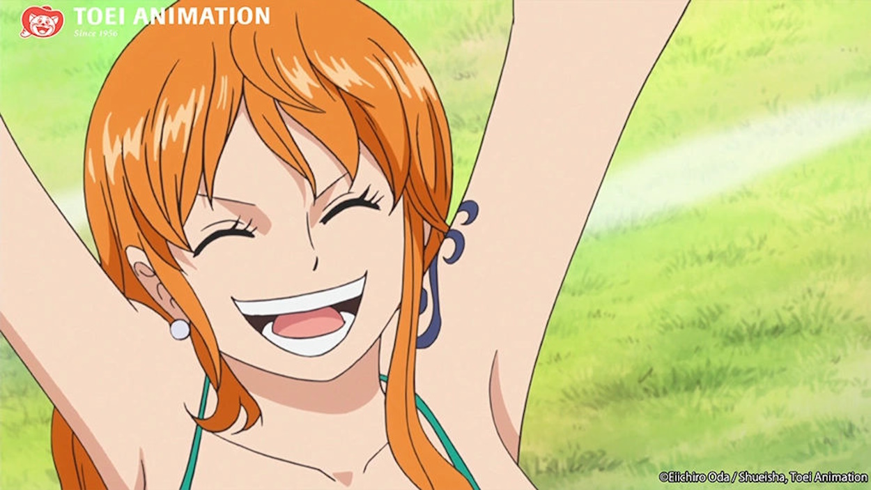 Nami celebrating in One Piece