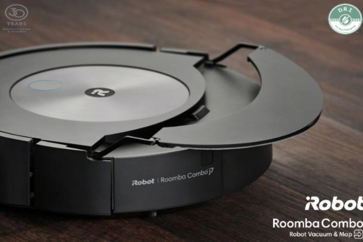 Roomba j7+ vacuum cleaner and mop on a wooden floor