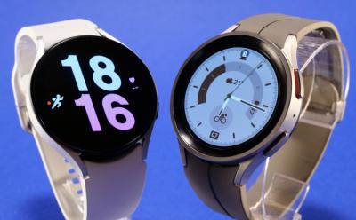 Samsung Galaxy Watch 5 showcased with a blue background in a white and gray color options