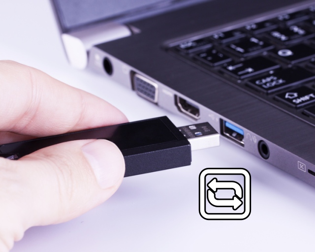 A USB Device being unplugged from a laptop