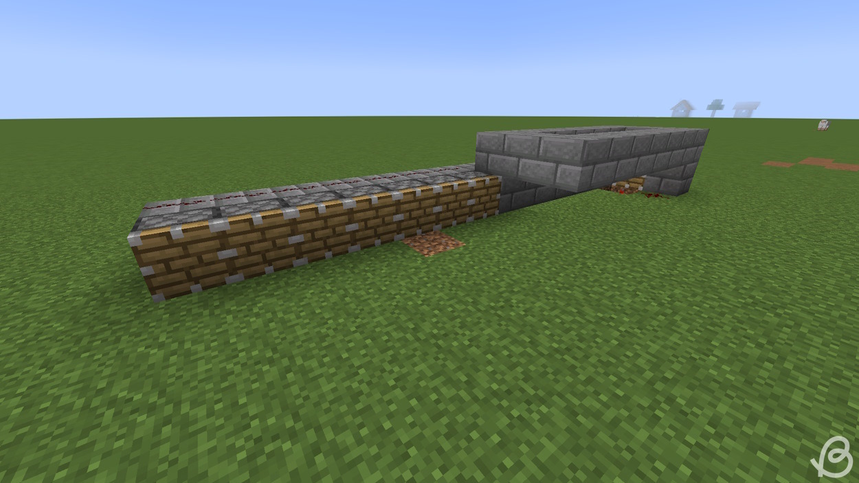 Pistons next to a cobblestone generator that're going to push the cobblestone away in Minecraft