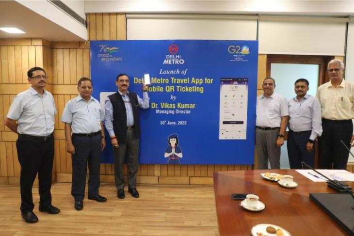 This picture represents the launch of the DMRC Metro Travel App