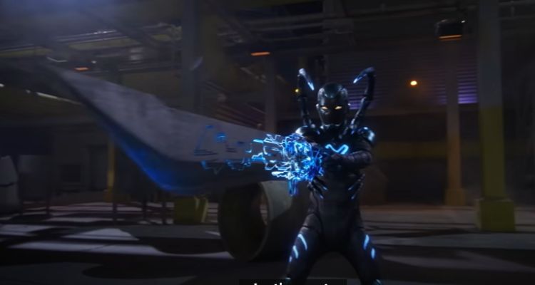 Blue beetle equipped with a sword