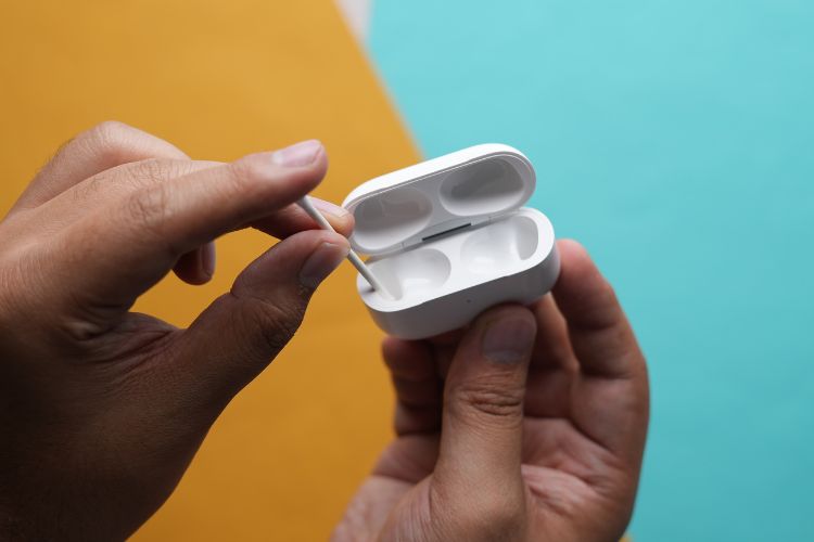 Use a cotton swab to clean the interior of the AirPods case