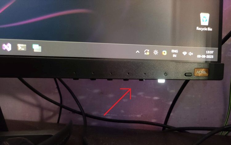 monitor buttons to change brightness in external monitor
