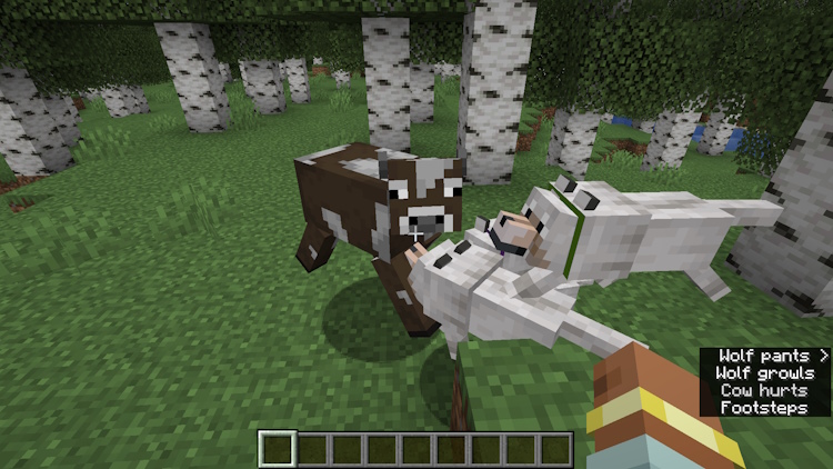Dogs attacking a cow, after the player has hit it