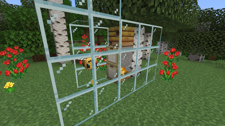 Enclosing a bee nest with a flower inside with glass blocks, so bees produce honey faster in Minecraft