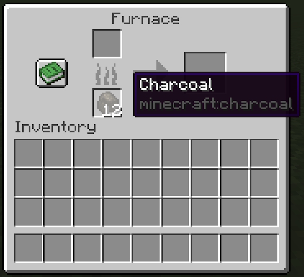 Placing charcoal in the bottom slot of the furnace in Minecraft