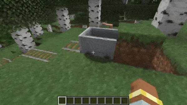 Minecart traveling on top of rails in Minecraft