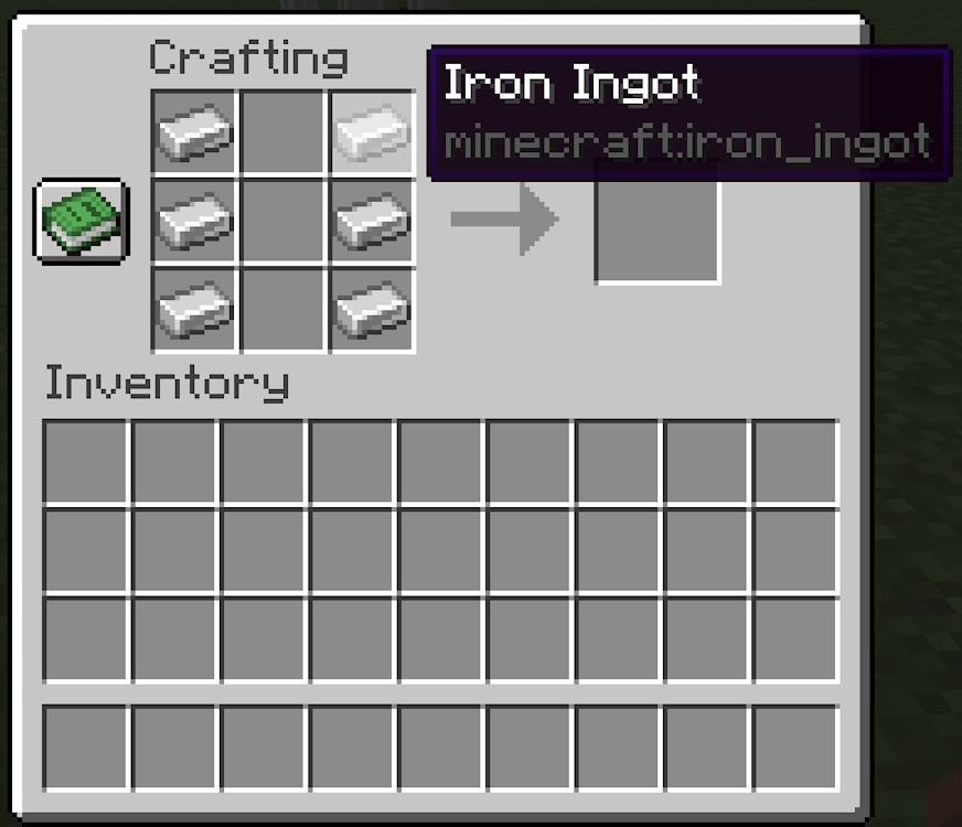Iron ingots filling the left and right columns of the crafting tables grid