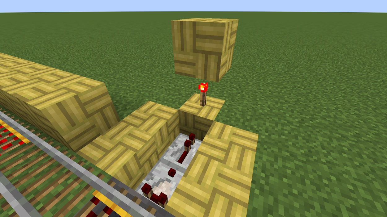 Repeater facing into a full block with a redstone torch above and another solid block above it