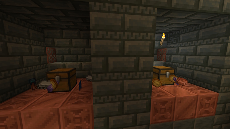 Two loot chests and some possible loot items next to them in Minecraft snapshot 23w45a