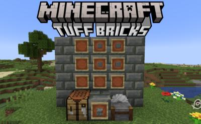 Crafting table and stonecutter next to tuff bricks in Minecraft