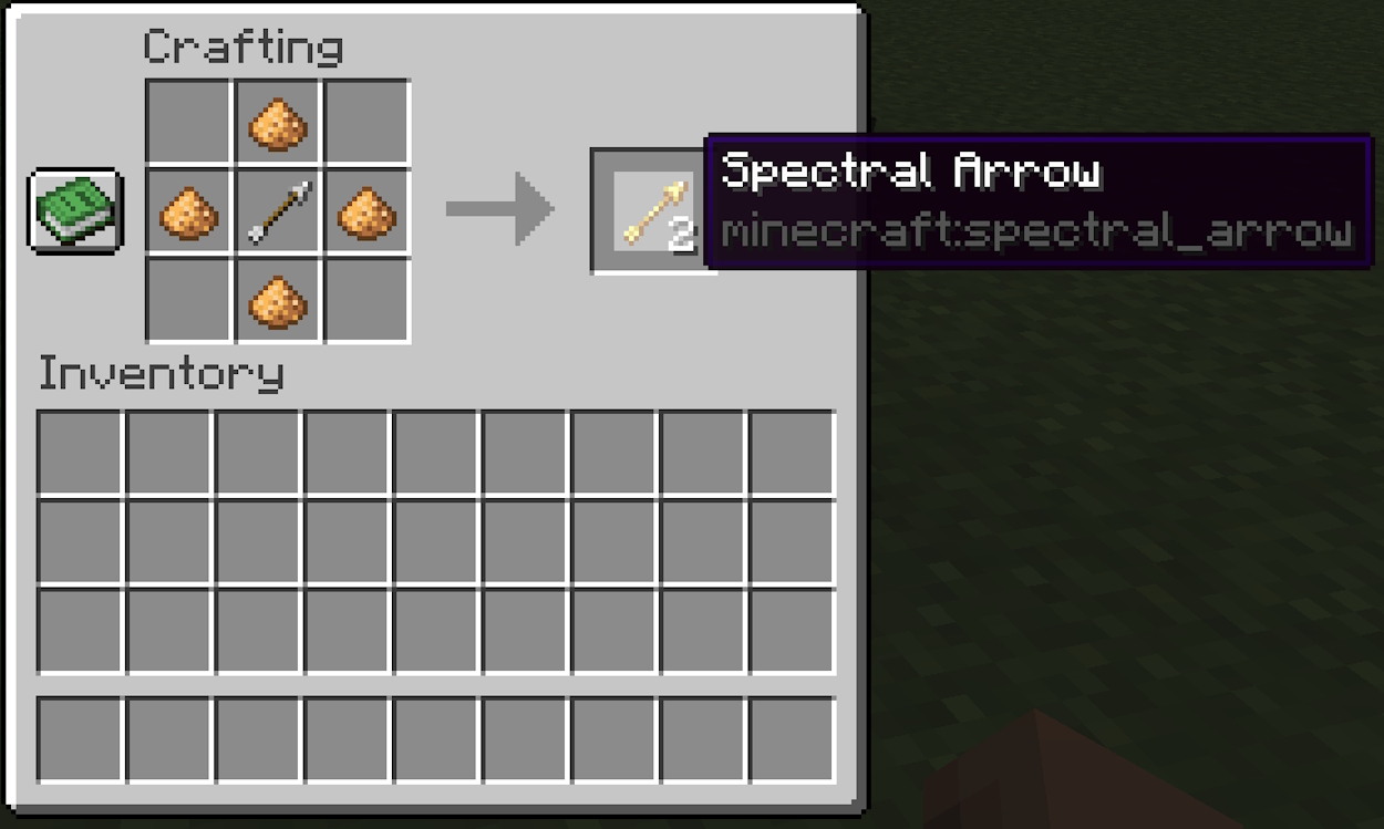 Add glowstone dust around the arrow in a diamond shape to finish of the spectral arrow recipe in Minecraft
