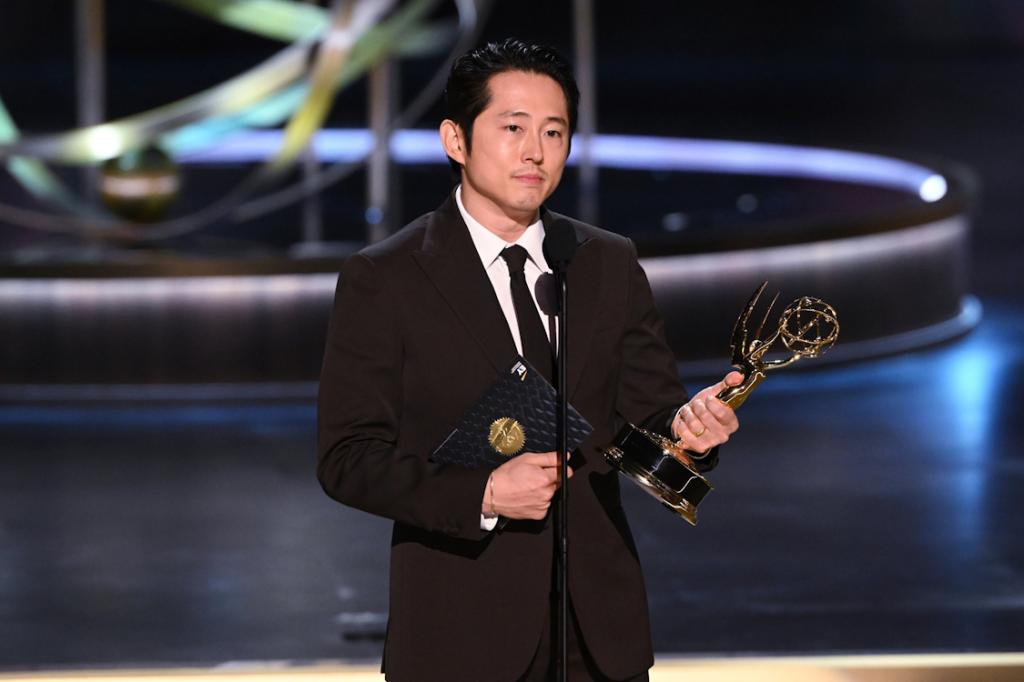 Steven Yeun with Emmy Award