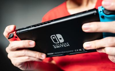 Nintendo Switch in the hands of a kid