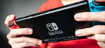 Nintendo Switch in the hands of a kid